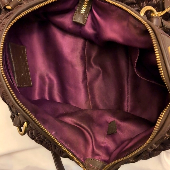 Here is a 70th anniversary edition Coach bag - Picture 12 of 15